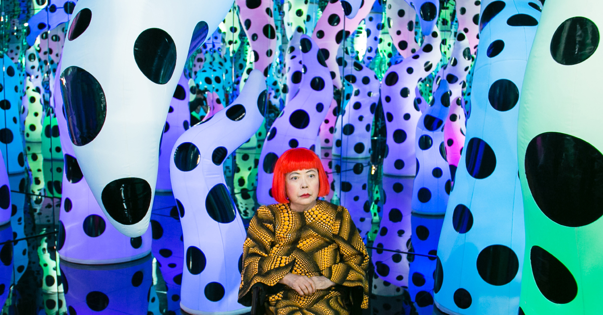 Yayoi Kusama sitting in "Love is Calling" during her solo exhibition at David Zwirner in New York.